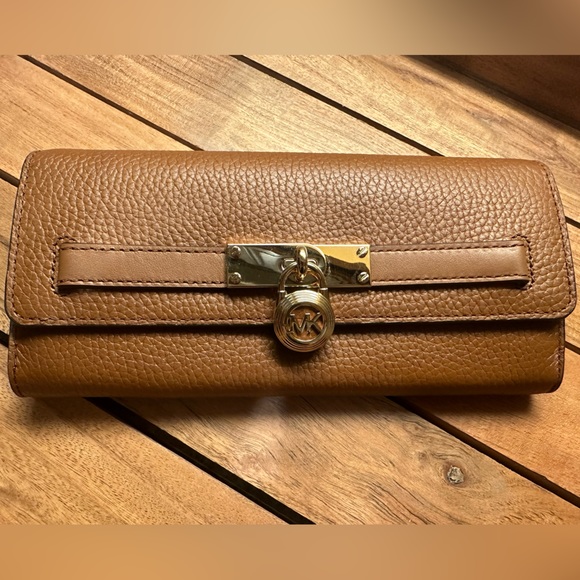 Michael Kors wallet brand new never used. Brown with gold accents. $148 new. - Picture 1 of 14